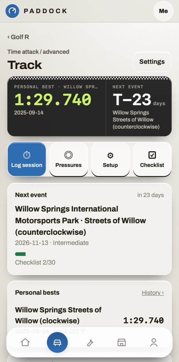 Paddock Garage on a phone: track days at Streets of Willow, with the personal best and the next event.